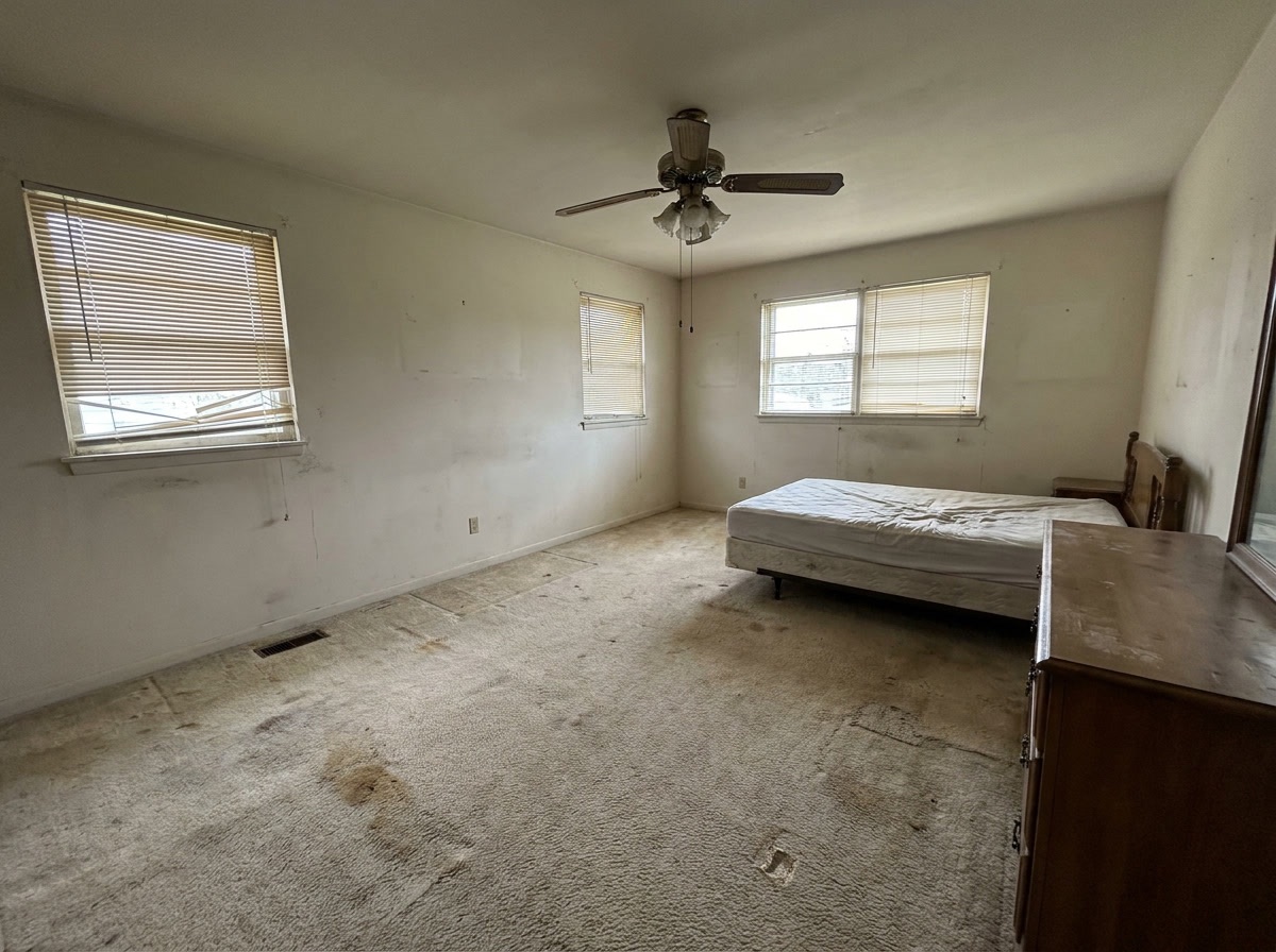 Plain dated bedroom before upgrade